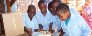 Kids receiving books